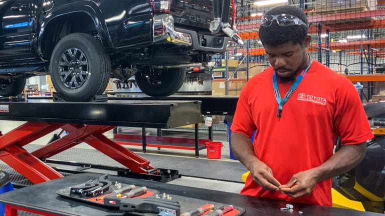 Associate working at new Vehicle Processing Center in Commerce, Ga., in 2020 Associate working at new Vehicle Processing Center in Commerce, Ga., in 2020